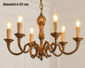 Lustre en bronze à 6 lumières avec médaillon ovale central et bras à volutes, diamètre 55 cm
