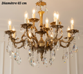 Lustre en bronze à 12 lumières sur deux niveaux, orné de pampilles en cristal, diamètre 65 cm