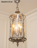 Suspension lanterne cylindrique en bronze argenté à décor feuillagé et parois transparentes, diamètre 25 cm