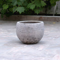 Pot décoratif arrondi gris texturé