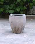 Pot décoratif galbé beige grisé texturé